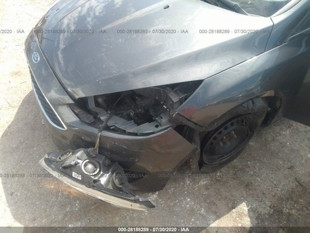 Photo 5 VIN: 1FADP3E26JL293031 - FORD FOCUS 