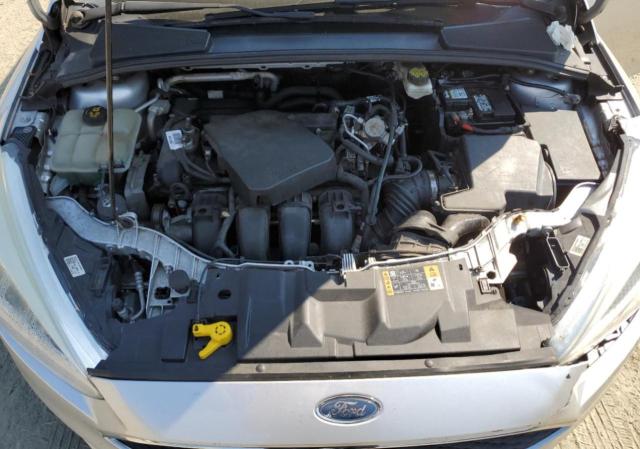 Photo 10 VIN: 1FADP3E27HL282579 - FORD FOCUS 