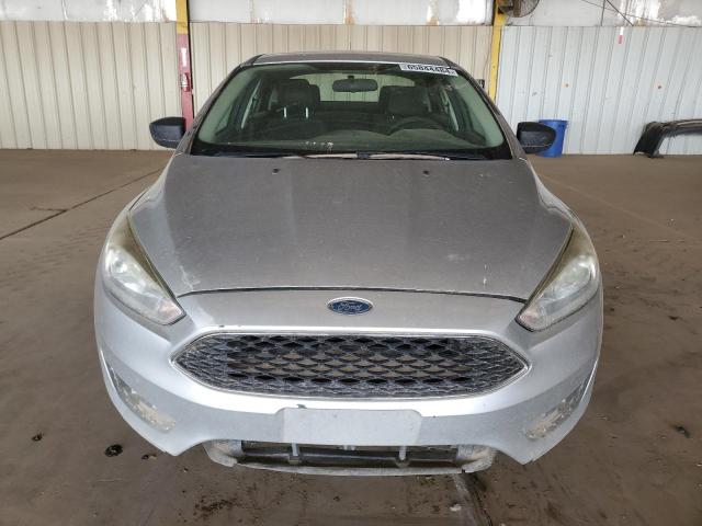 Photo 4 VIN: 1FADP3E27JL260930 - FORD FOCUS 