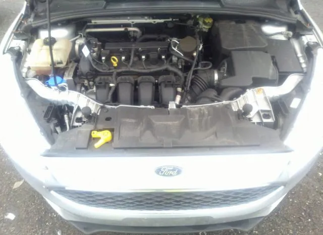 Photo 9 VIN: 1FADP3E28GL210742 - FORD FOCUS 