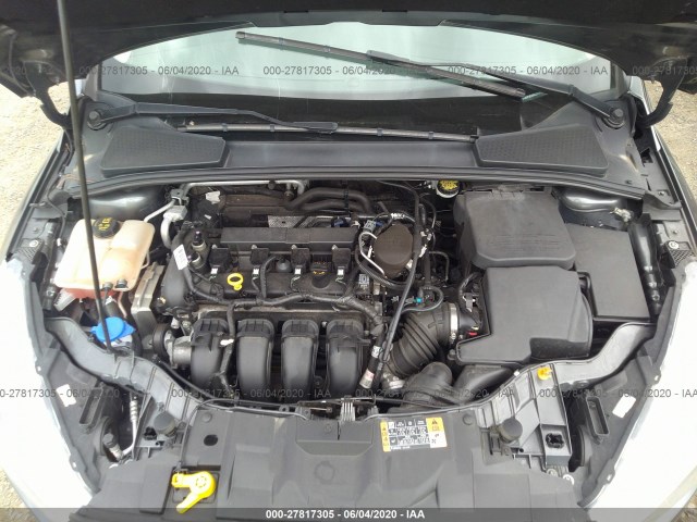 Photo 9 VIN: 1FADP3E28GL225919 - FORD FOCUS 