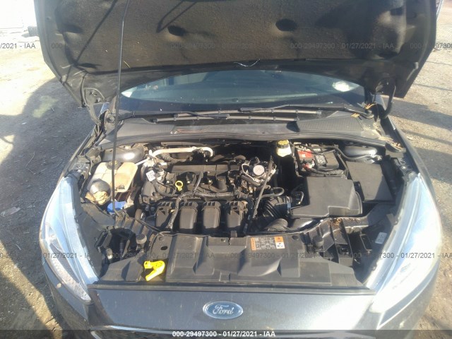 Photo 9 VIN: 1FADP3E28HL241619 - FORD FOCUS 