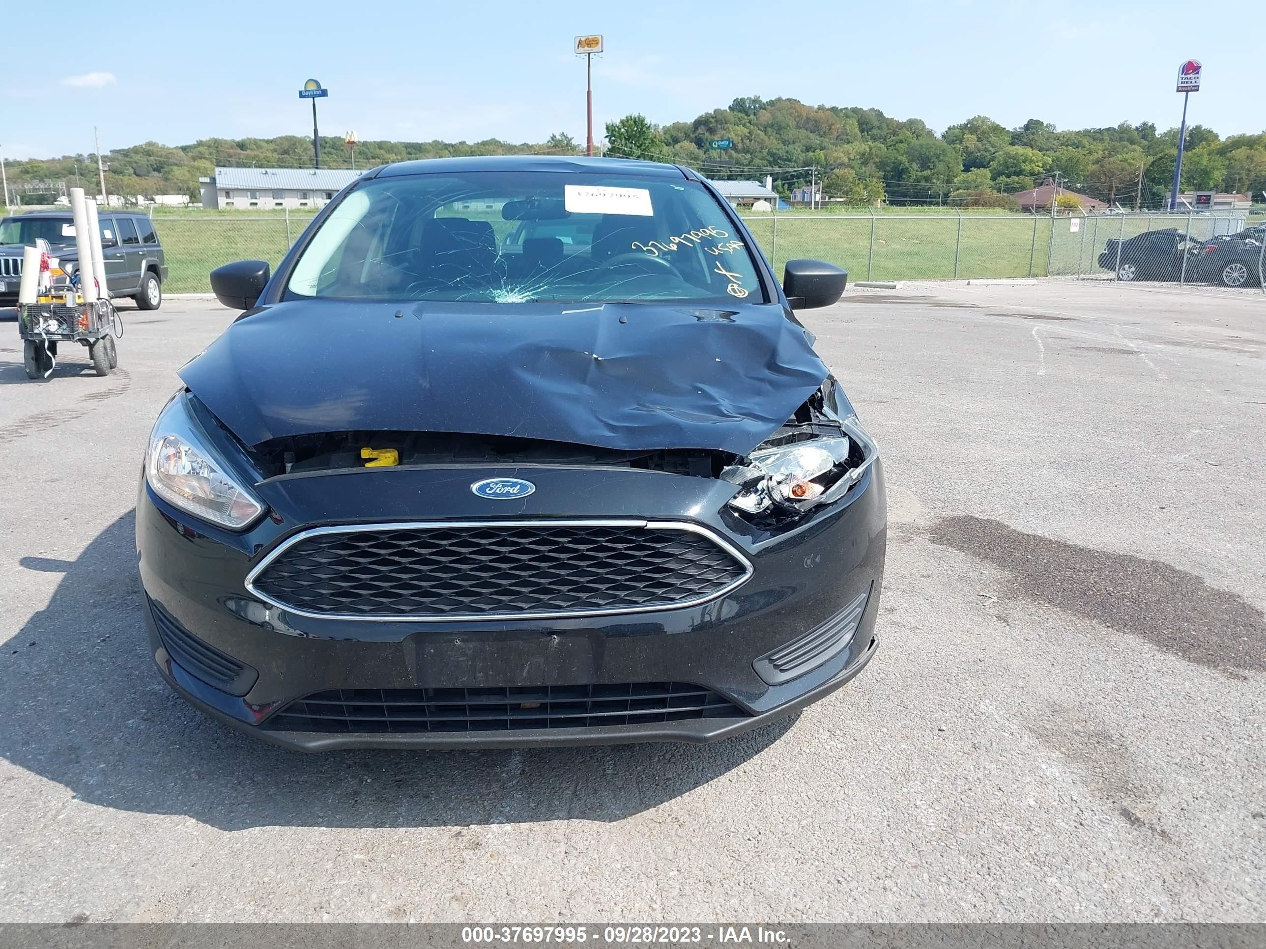 Photo 11 VIN: 1FADP3E28HL284230 - FORD FOCUS 