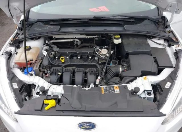 Photo 9 VIN: 1FADP3E28HL311247 - FORD FOCUS 