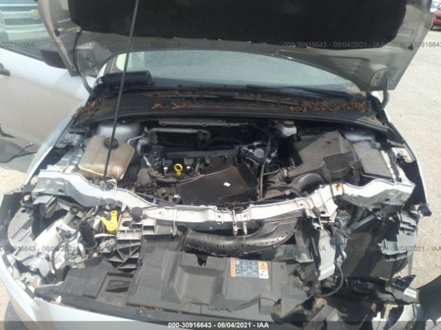 Photo 9 VIN: 1FADP3E28JL277350 - FORD FOCUS 