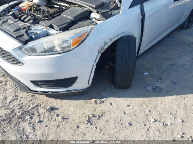 Photo 5 VIN: 1FADP3E29GL202004 - FORD FOCUS 