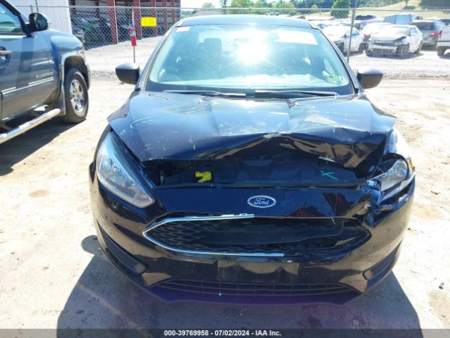 Photo 5 VIN: 1FADP3E29GL211124 - FORD FOCUS 