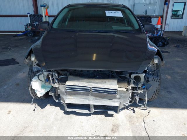 Photo 5 VIN: 1FADP3E29GL345728 - FORD FOCUS 