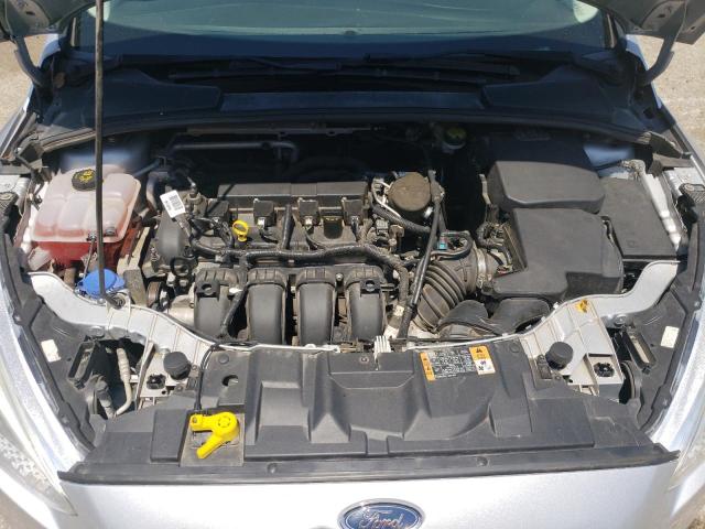 Photo 10 VIN: 1FADP3E2XFL386125 - FORD FOCUS 