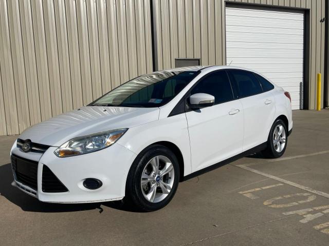 Photo 1 VIN: 1FADP3F20DL131141 - FORD FOCUS SE 