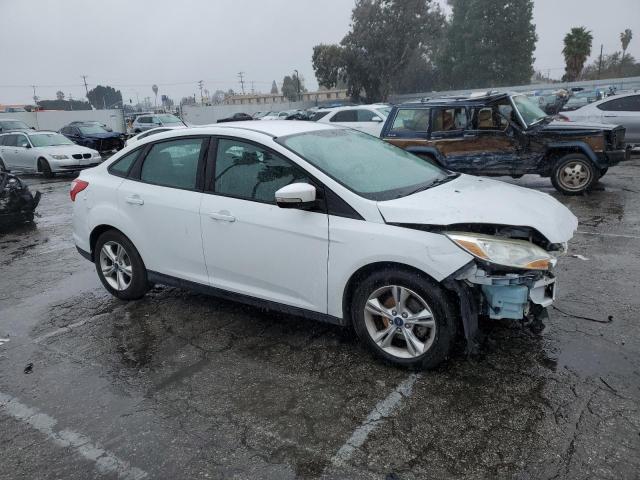 Photo 3 VIN: 1FADP3F20DL165094 - FORD FOCUS SE 