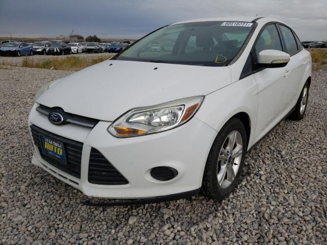 Photo 1 VIN: 1FADP3F20DL251778 - FORD FOCUS SE 