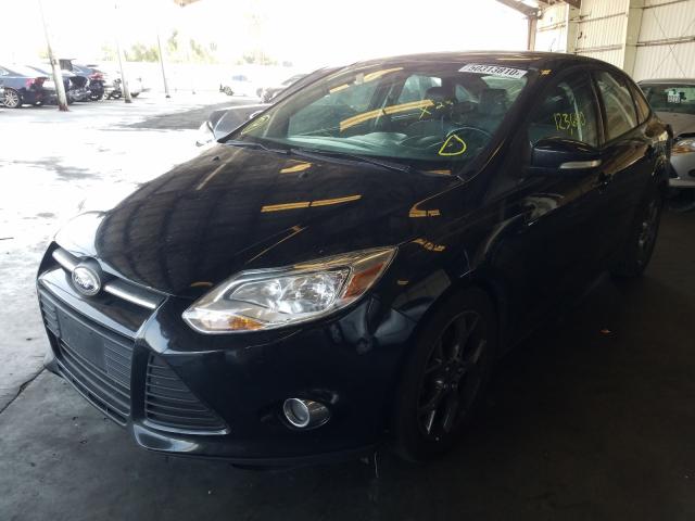 Photo 1 VIN: 1FADP3F20DL270587 - FORD FOCUS SE 