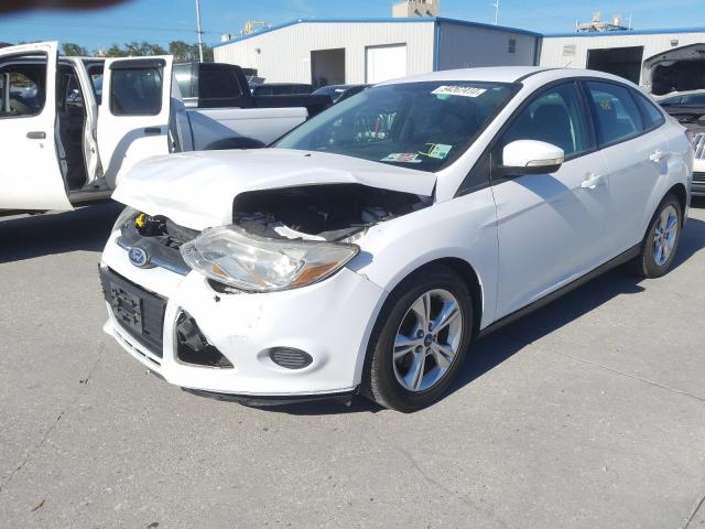 Photo 1 VIN: 1FADP3F20DL291388 - FORD FOCUS SE 