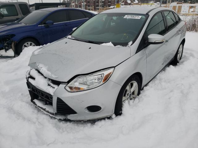 Photo 1 VIN: 1FADP3F20DL297286 - FORD FOCUS SE 