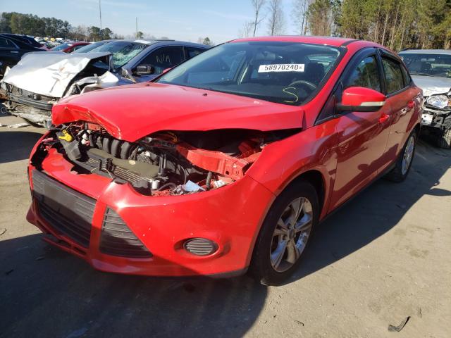 Photo 1 VIN: 1FADP3F20DL331808 - FORD FOCUS SE 