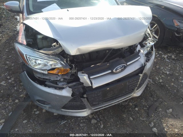 Photo 5 VIN: 1FADP3F20EL102501 - FORD FOCUS 