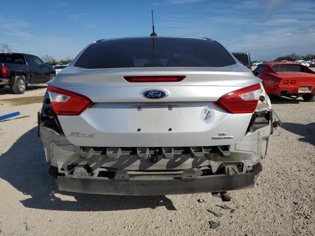 Photo 5 VIN: 1FADP3F20EL123073 - FORD FOCUS SE 