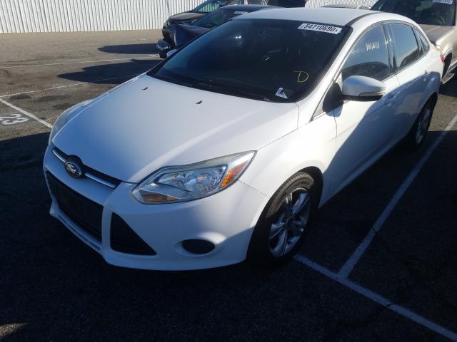 Photo 1 VIN: 1FADP3F20EL144974 - FORD FOCUS SE 