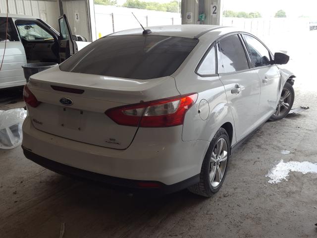 Photo 3 VIN: 1FADP3F20EL145221 - FORD FOCUS SE 