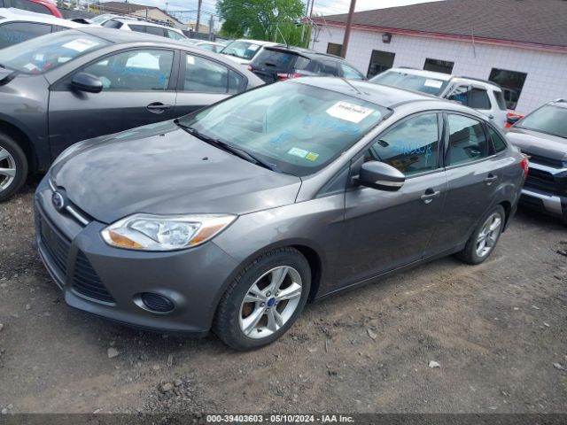 Photo 1 VIN: 1FADP3F20EL286063 - FORD FOCUS 