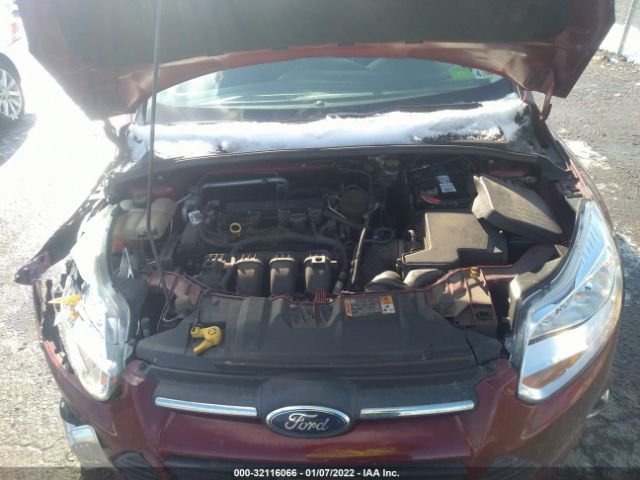 Photo 9 VIN: 1FADP3F20EL307025 - FORD FOCUS 