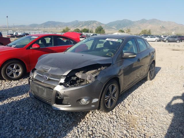 Photo 1 VIN: 1FADP3F20EL317036 - FORD FOCUS SE 