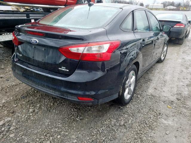 Photo 3 VIN: 1FADP3F20EL329929 - FORD FOCUS SE 