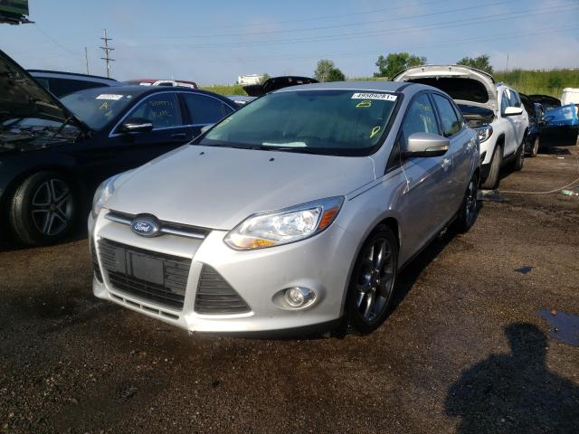 Photo 1 VIN: 1FADP3F20EL371369 - FORD FOCUS SE 