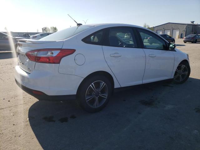 Photo 2 VIN: 1FADP3F20EL402748 - FORD FOCUS SE 