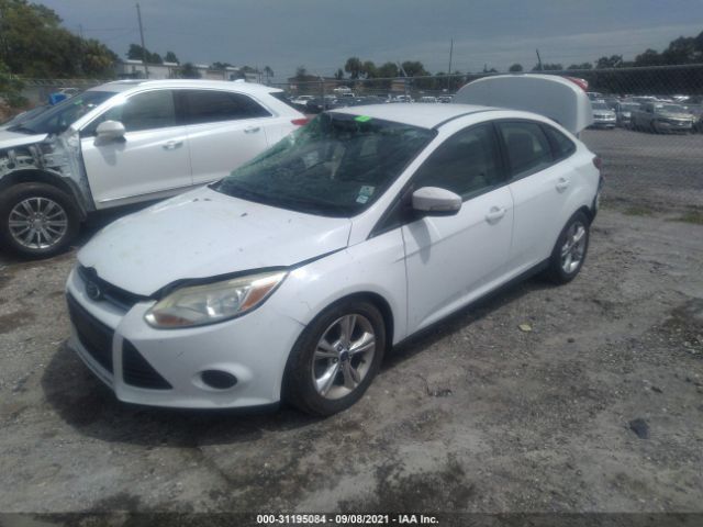 Photo 1 VIN: 1FADP3F20EL409196 - FORD FOCUS 