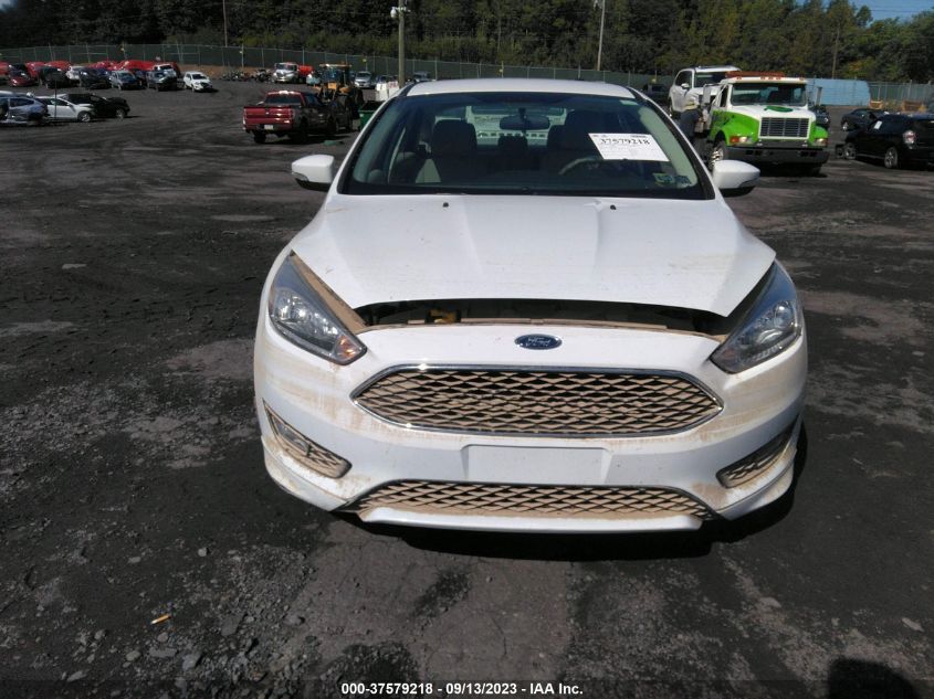 Photo 11 VIN: 1FADP3F20FL213907 - FORD FOCUS 