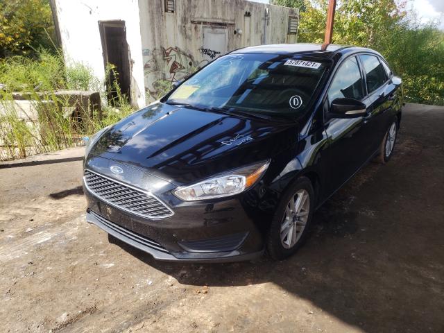 Photo 1 VIN: 1FADP3F20FL273525 - FORD FOCUS SE 