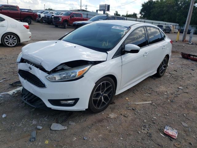 Photo 1 VIN: 1FADP3F20FL323582 - FORD FOCUS SE 