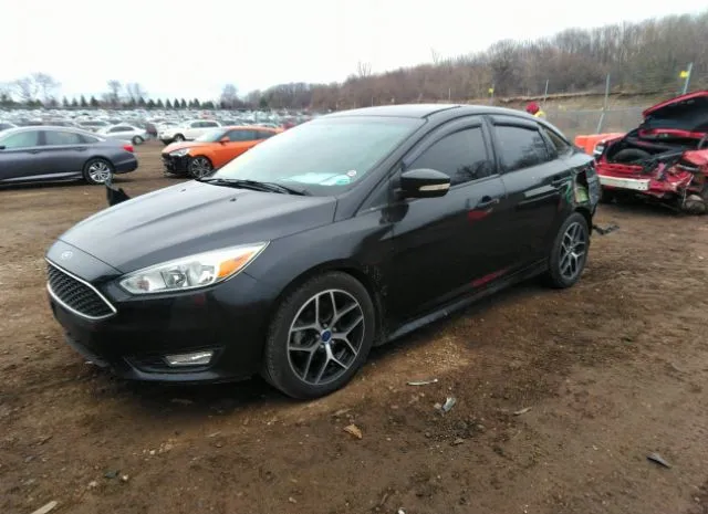 Photo 1 VIN: 1FADP3F20FL334582 - FORD FOCUS 