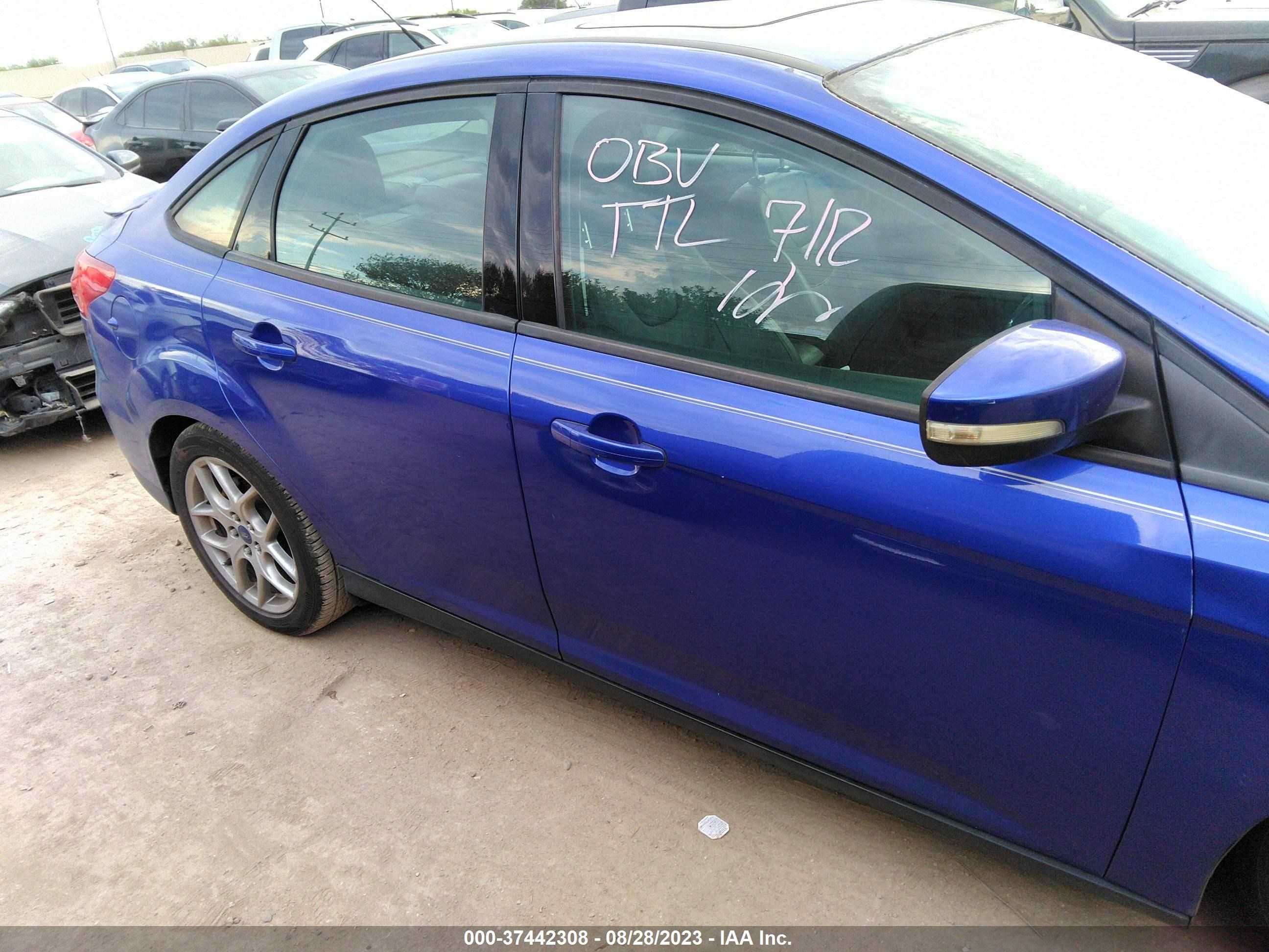 Photo 12 VIN: 1FADP3F20FL348000 - FORD FOCUS 