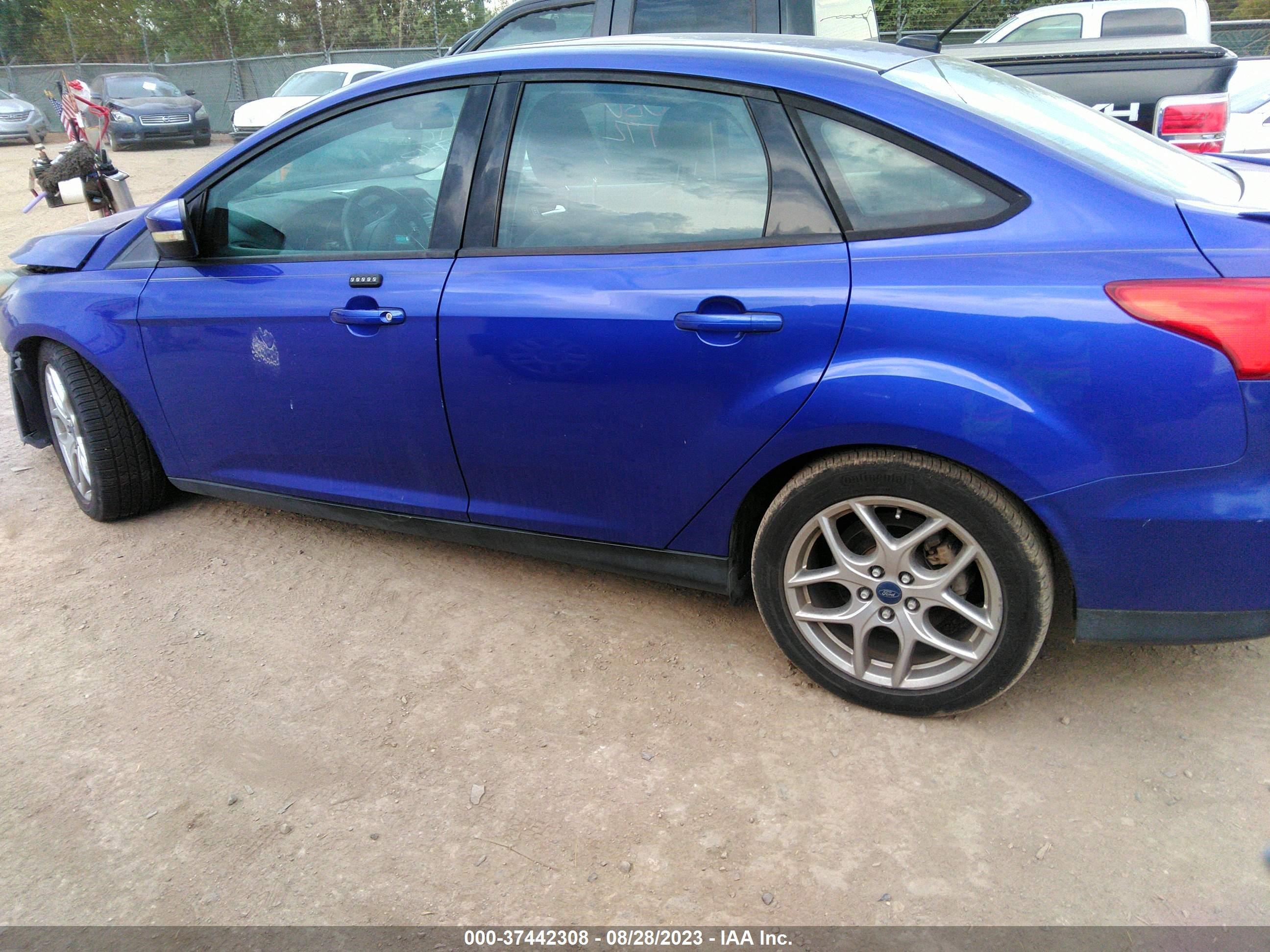 Photo 13 VIN: 1FADP3F20FL348000 - FORD FOCUS 