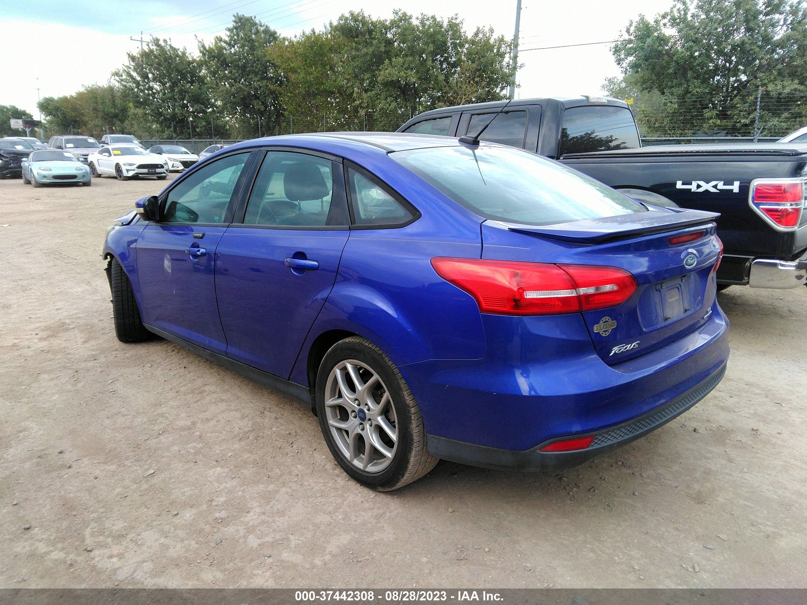 Photo 2 VIN: 1FADP3F20FL348000 - FORD FOCUS 