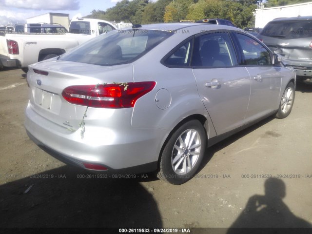 Photo 3 VIN: 1FADP3F20FL373995 - FORD FOCUS 