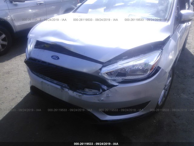 Photo 5 VIN: 1FADP3F20FL373995 - FORD FOCUS 