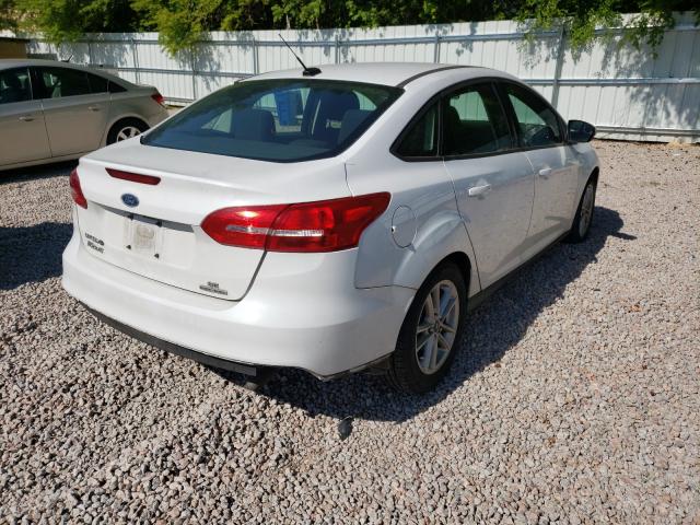 Photo 3 VIN: 1FADP3F20GL219210 - FORD FOCUS 