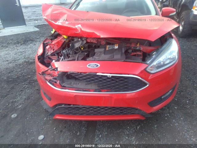 Photo 5 VIN: 1FADP3F20GL221720 - FORD FOCUS 