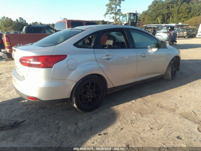 Photo 3 VIN: 1FADP3F20GL222981 - FORD FOCUS 