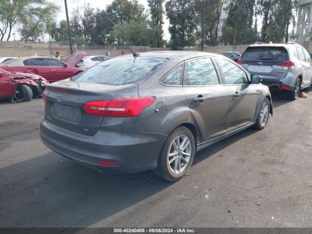 Photo 3 VIN: 1FADP3F20GL235018 - FORD FOCUS 