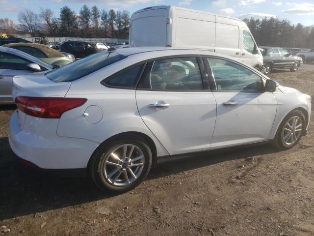 Photo 2 VIN: 1FADP3F20GL242440 - FORD FOCUS 