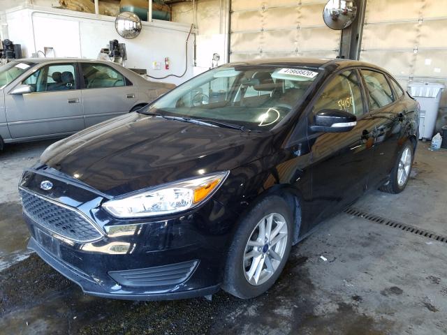 Photo 1 VIN: 1FADP3F20GL258816 - FORD FOCUS SE 