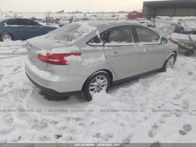 Photo 3 VIN: 1FADP3F20GL262705 - FORD FOCUS 