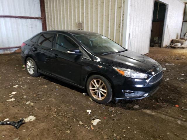 Photo 3 VIN: 1FADP3F20GL267483 - FORD FOCUS SE 