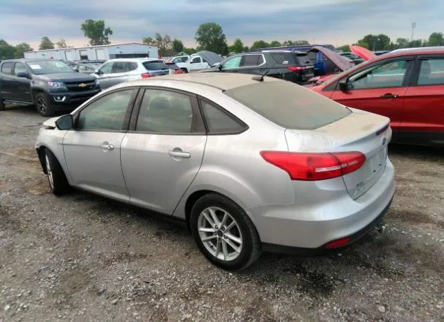 Photo 2 VIN: 1FADP3F20GL283022 - FORD FOCUS 