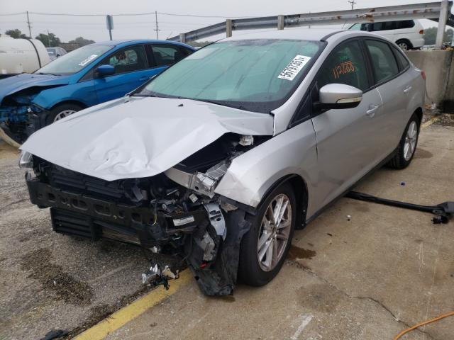 Photo 1 VIN: 1FADP3F20GL283389 - FORD FOCUS SE 